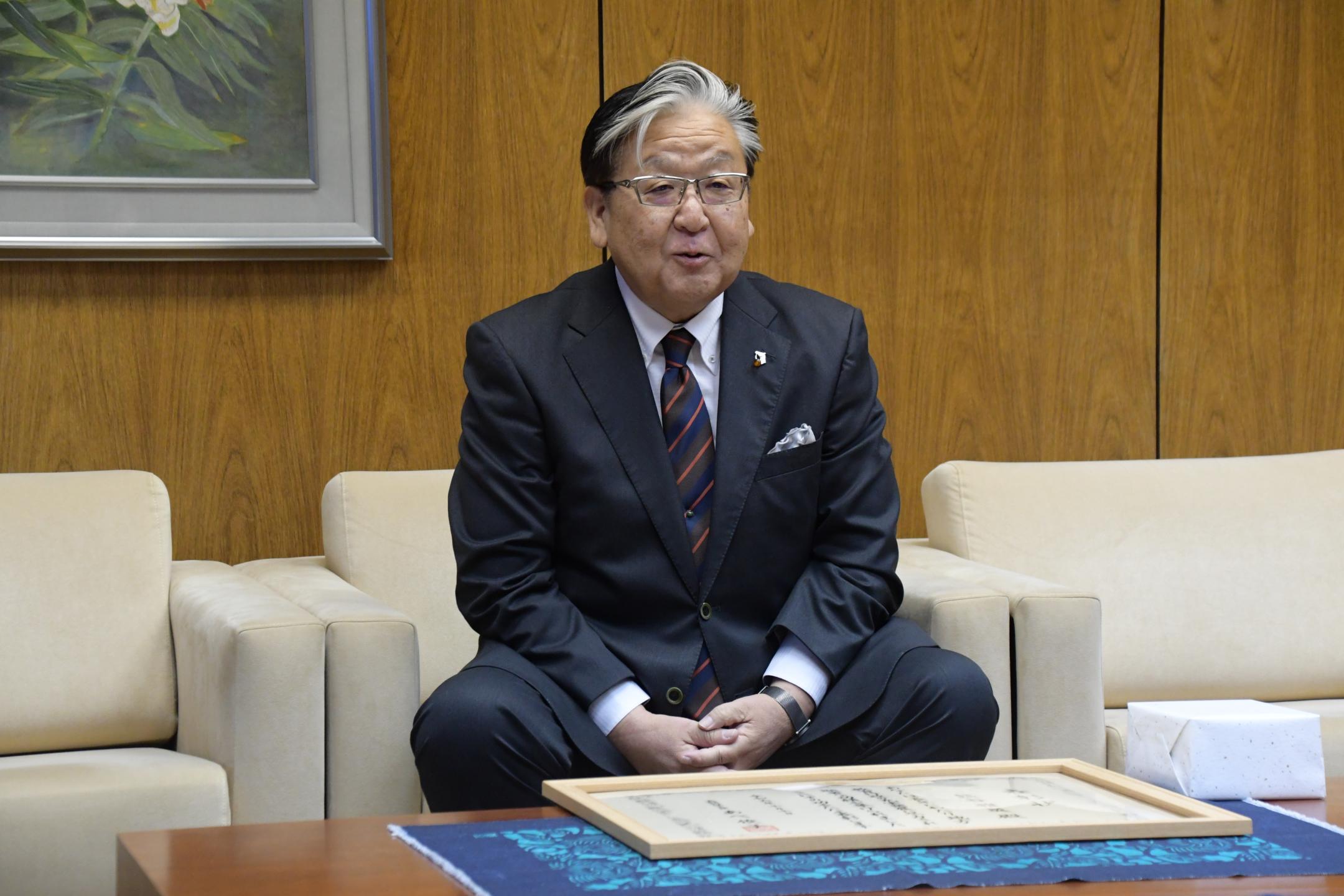 表彰について報告する熊谷さん