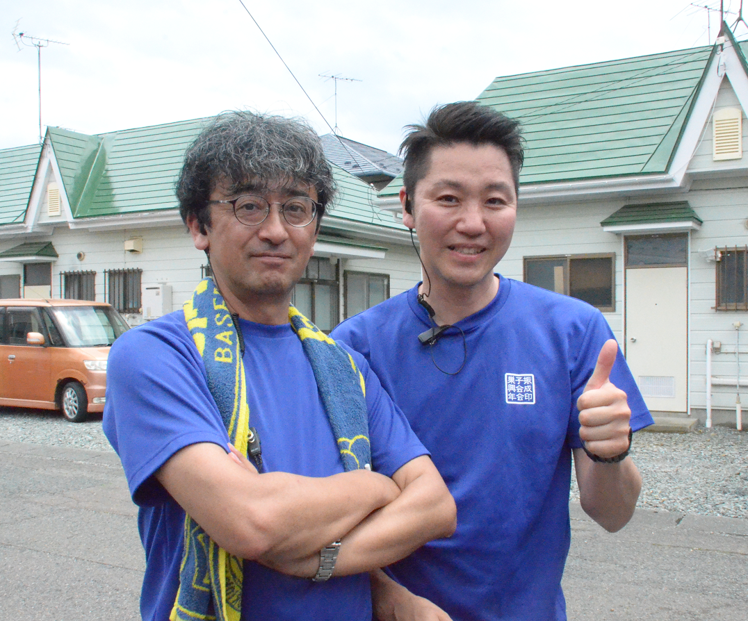 鷹巣子市主催者の笑顔